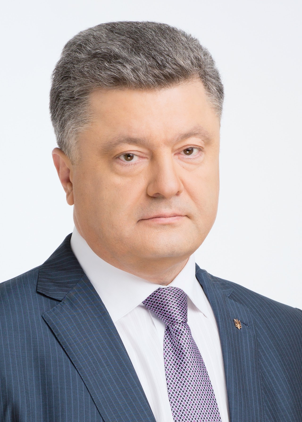 Pictured are Russian President Vladimir Putin and Crimean leaders signing the Treaty of the Ascension of Crimea. Credit: https://commons.wikimedia.org/wiki/Pictured is former Ukranian President Petro Poroshenko.Credit: h