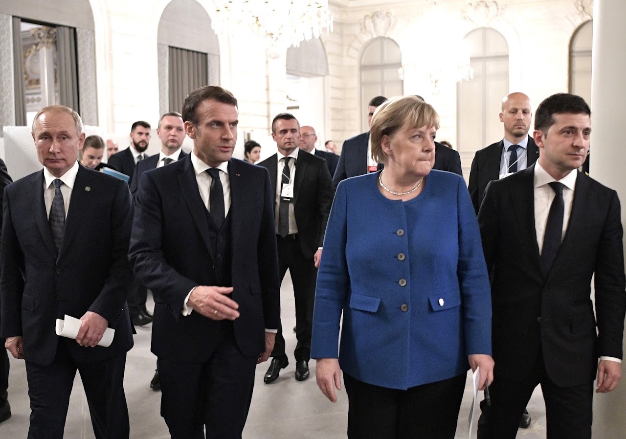 Pictured are current Ukrainian President Volodymyr Zelensky, former German Chancellor Angela Merkel, French President Emmanuel Macron, and Russian President Vladimir Putin in 2019.Credit: https://commons.wikimedia.org/wi